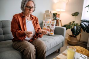 Senior woman suffering from wrist pain