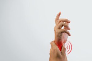 carpal tunnel syndrome in a Man's Hand on White Background