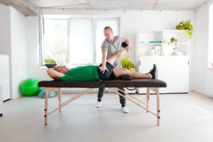 Man at physical therapy