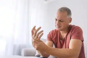 Man suffering with wrist pain