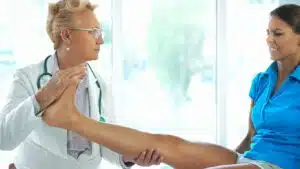 Ankle sprain examination by orthopedic doctor
