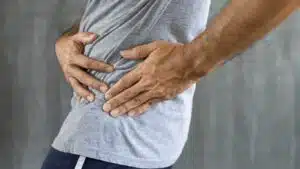 Man suffering from hip joint pain.