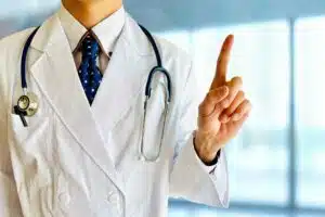 A hand specialist is demonstrating his ability to treat the condition known as trigger finger.